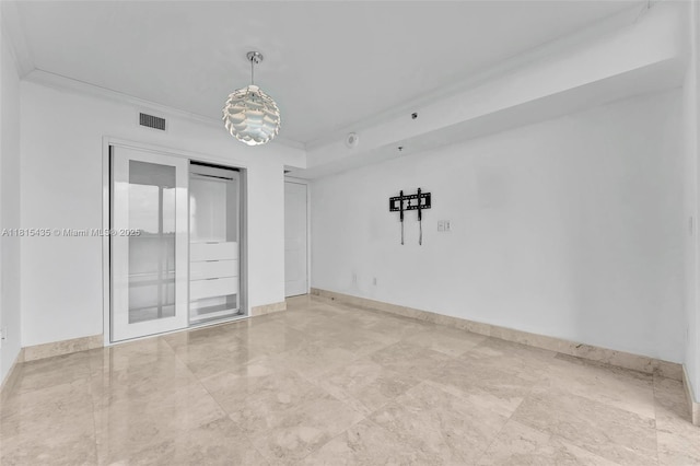 2641 N Flamingo Rd Unit 603N, Sunrise, FL 33323 - spare room featuring ornamental molding and baseboards