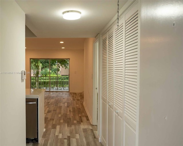 251 NW 76th Ave Unit 208, Margate, FL 33063 - hallway with wood finished floors, recessed lighting, and baseboards