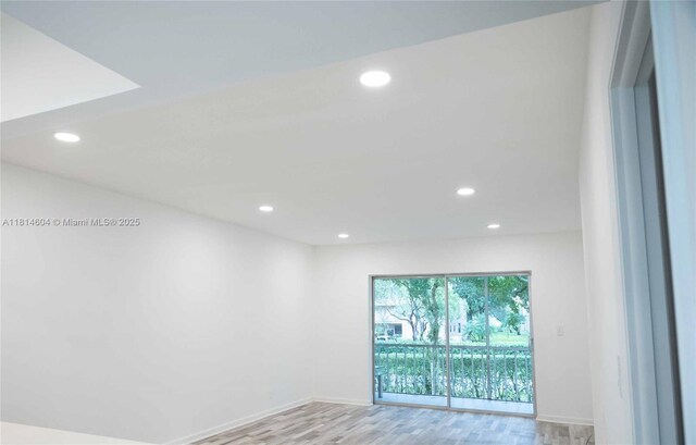 251 NW 76th Ave Unit 208, Margate, FL 33063 - unfurnished room with recessed lighting, light wood-type flooring, and baseboards