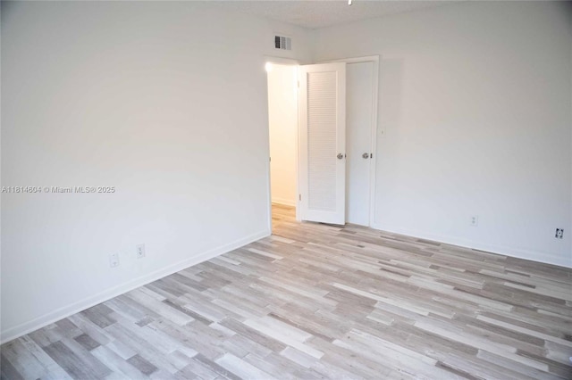 251 NW 76th Ave Unit 208, Margate, FL 33063 - empty room featuring light wood-style floors and baseboards