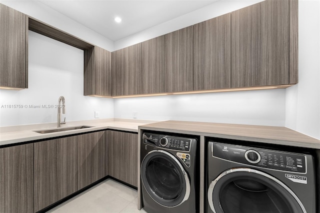 6200 Moss Ranch Rd, Pinecrest, FL 33156 - washroom featuring a sink, independent washer and dryer, and light tile patterned floors