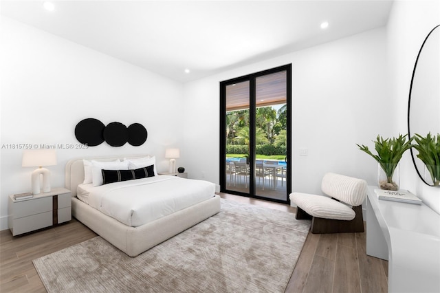 6200 Moss Ranch Rd, Pinecrest, FL 33156 - bedroom with access to outside, light wood finished floors, and recessed lighting