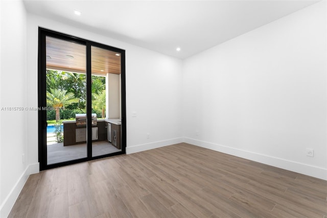 6200 Moss Ranch Rd, Pinecrest, FL 33156 - unfurnished room featuring light wood-type flooring, baseboards, and recessed lighting