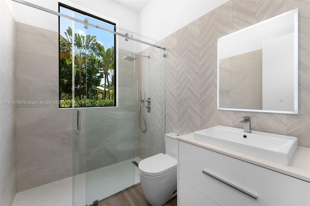 6200 Moss Ranch Rd, Pinecrest, FL 33156 - full bath with a shower stall, vanity, toilet, wood finished floors, and tile walls
