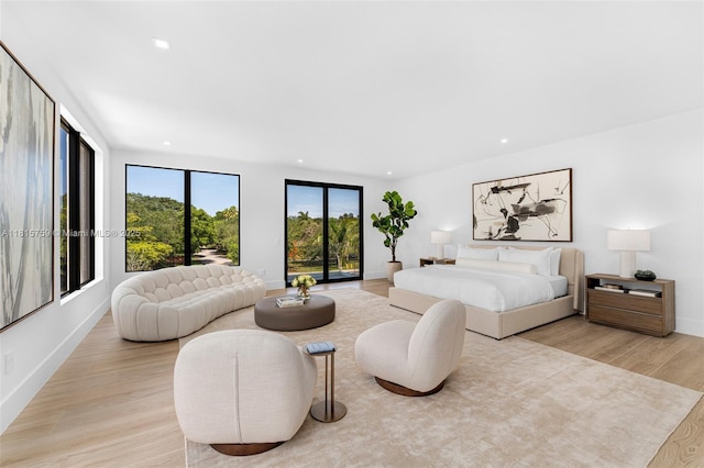 6200 Moss Ranch Rd, Pinecrest, FL 33156 - bedroom featuring light wood finished floors, recessed lighting, and baseboards