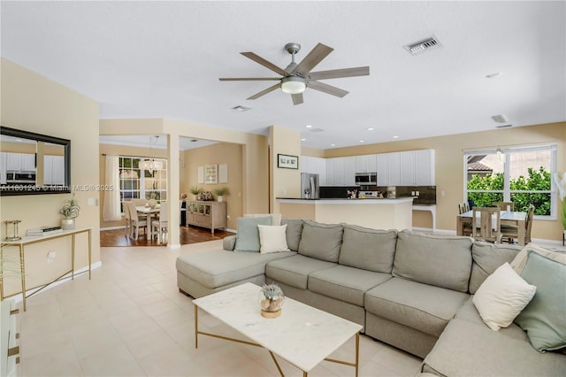 12890 Hyland Cir, Boca Raton, FL 33428 - living room with a ceiling fan