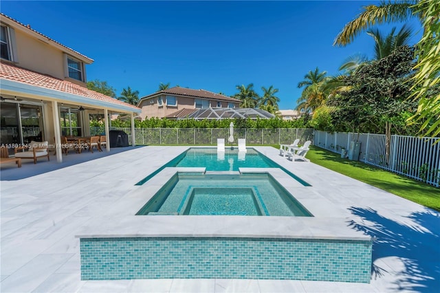 12890 Hyland Cir, Boca Raton, FL 33428 - view of pool with a patio area, ceiling fan, and a pool with connected hot tub