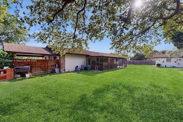 19520 SW 307th St, Homestead, FL 33030 - fenced backyard with a sunroom
