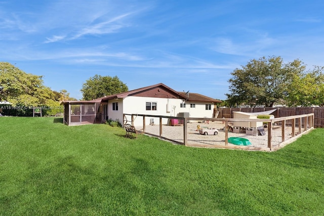 19520 SW 307th St, Homestead, FL 33030 - back of house featuring a sunroom and stucco siding