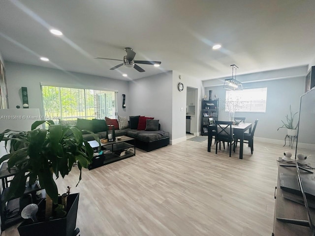 8002 Lagos De Campo Blvd Unit B-107, Tamarac, FL 33321 - living room featuring healthy amount of natural light, light wood-type flooring, baseboards, and recessed lighting