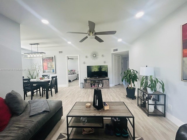 8002 Lagos De Campo Blvd Unit B-107, Tamarac, FL 33321 - living room with light wood-style floors, a ceiling fan, baseboards, and recessed lighting