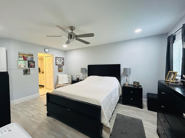 8002 Lagos De Campo Blvd Unit B-107, Tamarac, FL 33321 - bedroom featuring light wood-style floors, baseboards, recessed lighting, ceiling fan, and connected bathroom