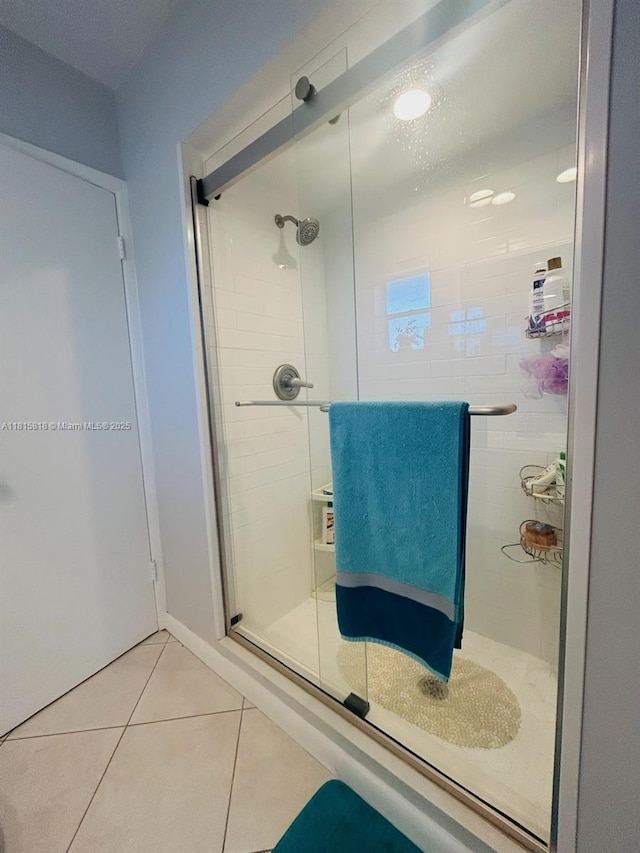 8002 Lagos De Campo Blvd Unit B-107, Tamarac, FL 33321 - bathroom featuring a shower stall and tile patterned flooring