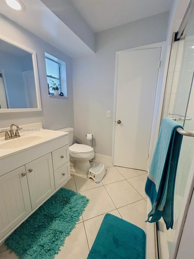 8002 Lagos De Campo Blvd Unit B-107, Tamarac, FL 33321 - bathroom with vanity, tile patterned flooring, and toilet