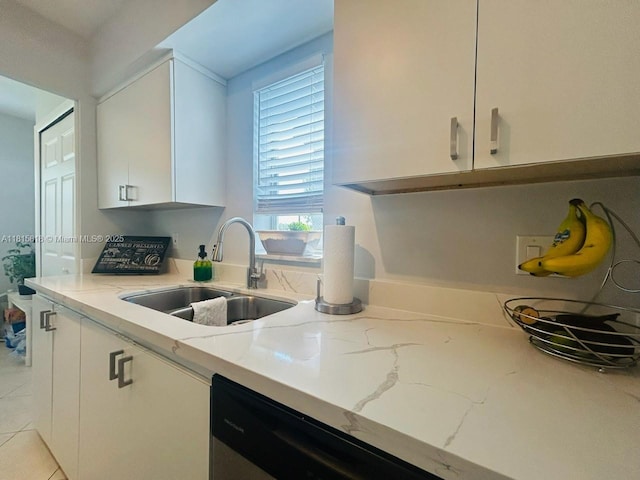 8002 Lagos De Campo Blvd Unit B-107, Tamarac, FL 33321 - kitchen with a sink, light stone counters, and white cabinets