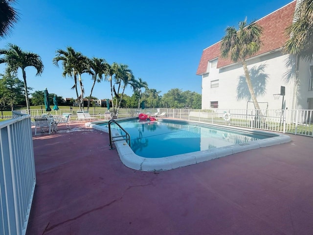 8002 Lagos De Campo Blvd Unit B-107, Tamarac, FL 33321 - community pool featuring a patio