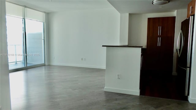 300 S Biscayne Blvd Unit 2705, Miami, FL 33131 - unfurnished room featuring baseboards and dark wood finished floors