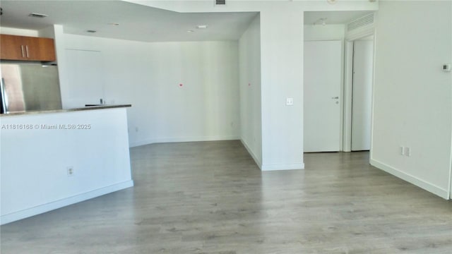 300 S Biscayne Blvd Unit 2705, Miami, FL 33131 - unfurnished living room with light wood finished floors and baseboards