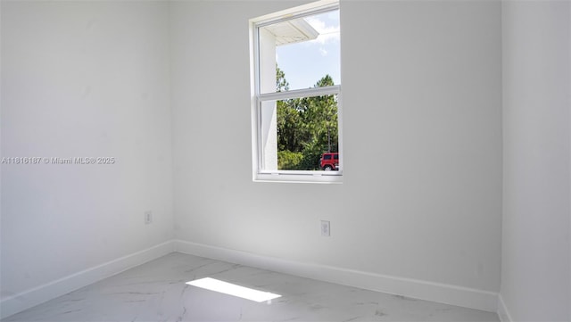 1351 Sulstone Dr, Punta Gorda, FL 33983 - unfurnished room featuring baseboards and marble finish floors