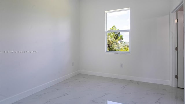 1351 Sulstone Dr, Punta Gorda, FL 33983 - spare room with light marble finish flooring and baseboards