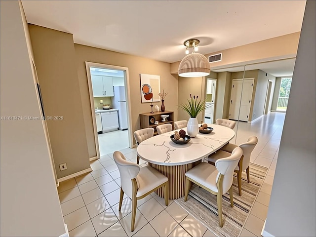 1000 Quayside Te Unit 410, Miami, FL 33138 - dining room featuring light tile patterned floors