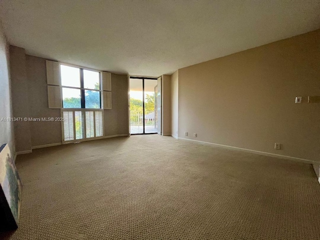 1000 Quayside Te Unit 410, Miami, FL 33138 - carpeted empty room featuring baseboards