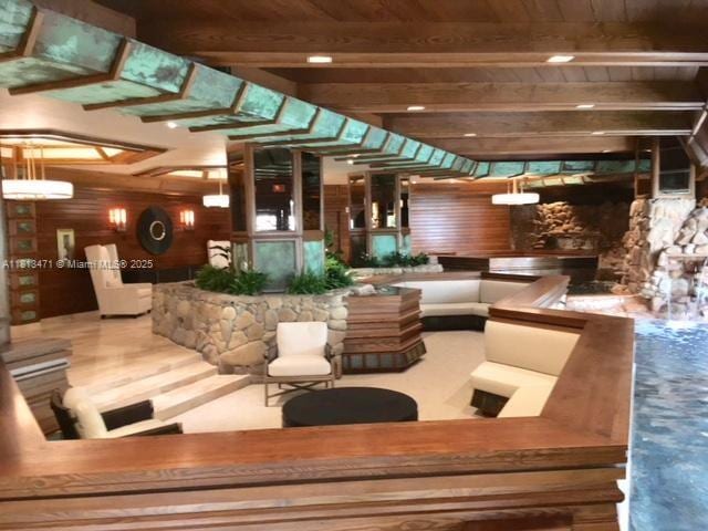 1000 Quayside Te Unit 410, Miami, FL 33138 - community lobby featuring wooden ceiling with exposed beams