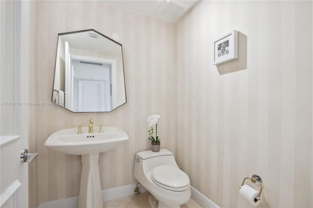 781 Crandon Blvd Unit 1802, Key Biscayne, FL 33149 - bathroom with wallpapered walls, toilet, and baseboards