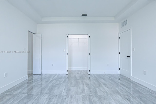 2725 NW 7th St, Fort Lauderdale, FL 33311 - spare room featuring a tray ceiling and baseboards