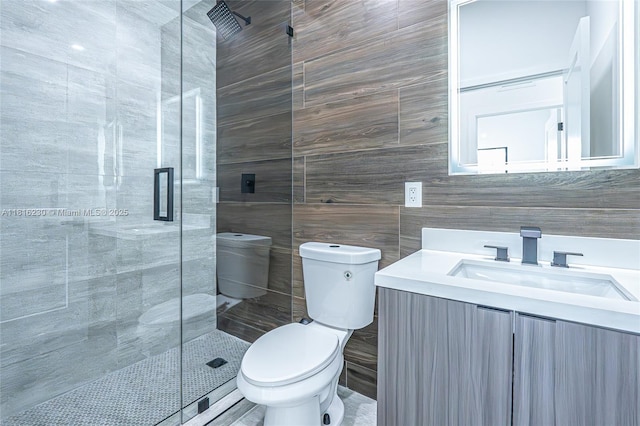 2725 NW 7th St, Fort Lauderdale, FL 33311 - bathroom featuring a shower stall, toilet, tile walls, and vanity