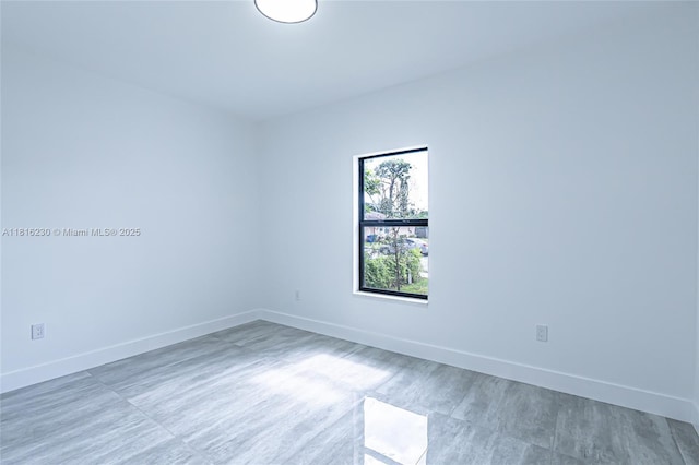 2725 NW 7th St, Fort Lauderdale, FL 33311 - spare room featuring baseboards