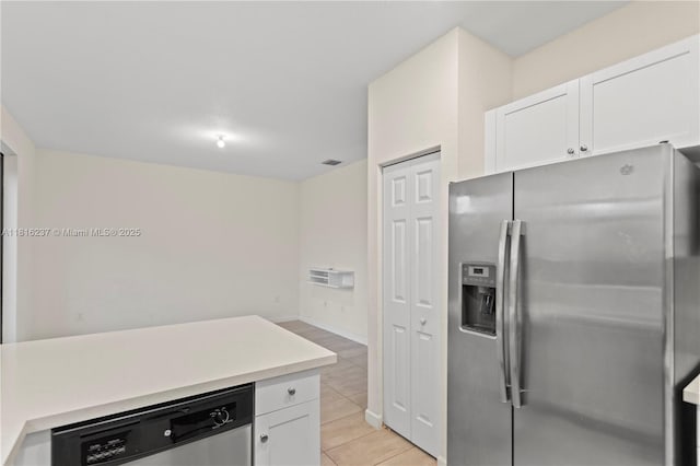 6496 S Anise Ct, Davie, FL 33314 - kitchen with stainless steel appliances, white cabinetry, and light countertops