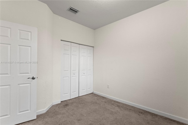 6496 S Anise Ct, Davie, FL 33314 - unfurnished bedroom featuring carpet, baseboards, and a closet