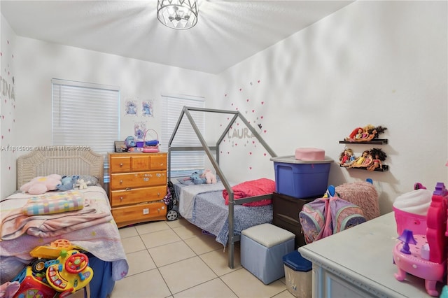 4441 SW Savona Blvd, Port St Lucie, FL 34953 - bedroom with light tile patterned floors