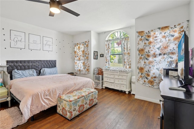 4441 SW Savona Blvd, Port St Lucie, FL 34953 - bedroom featuring dark wood finished floors, a ceiling fan, and baseboards