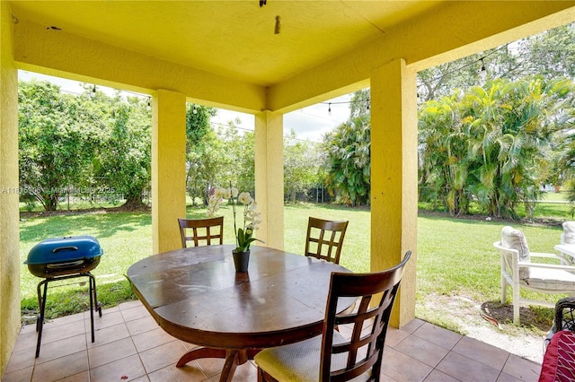 4441 SW Savona Blvd, Port St Lucie, FL 34953 - view of patio / terrace featuring outdoor dining space and grilling area