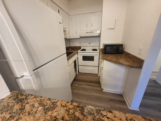 600 Layne Blvd Unit 118, Hallandale Beach, FL 33009 - kitchen with white appliances, under cabinet range hood, dark wood-style floors, and white cabinetry
