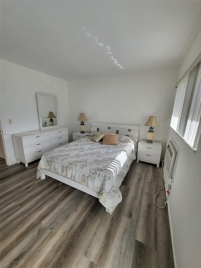 600 Layne Blvd Unit 118, Hallandale Beach, FL 33009 - bedroom featuring dark wood-type flooring and a wall mounted AC