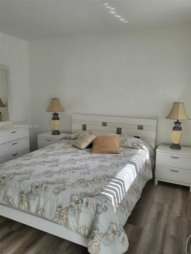 600 Layne Blvd Unit 118, Hallandale Beach, FL 33009 - bedroom with dark wood-style floors