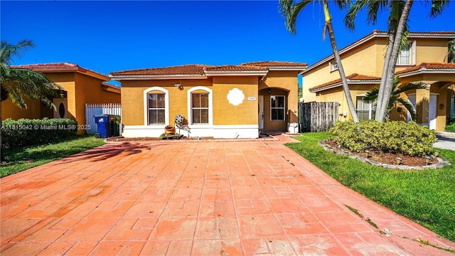 7997 NW 199th Ter, Hialeah, FL 33015 - mediterranean / spanish house featuring stucco siding and a tiled roof