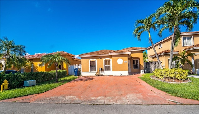 7997 NW 199th Ter, Hialeah, FL 33015 - mediterranean / spanish home featuring stucco siding and a tile roof