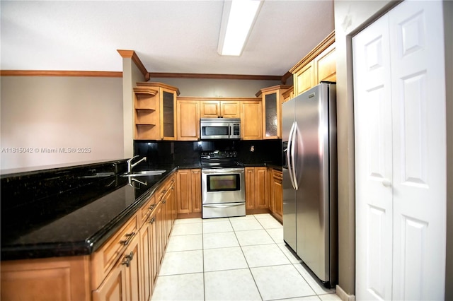 7997 NW 199th Ter, Hialeah, FL 33015 - kitchen with appliances with stainless steel finishes, tasteful backsplash, ornamental molding, light tile patterned flooring, and glass insert cabinets