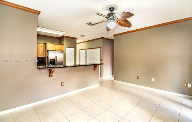 7997 NW 199th Ter, Hialeah, FL 33015 - unfurnished living room with ceiling fan, crown molding, and light tile patterned floors