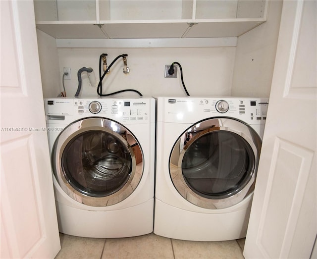 7997 NW 199th Ter, Hialeah, FL 33015 - washroom featuring light tile patterned floors and washing machine and dryer