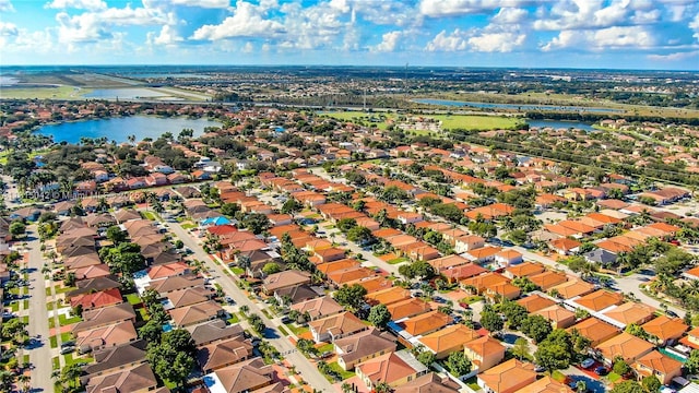 7997 NW 199th Ter, Hialeah, FL 33015 - aerial perspective of suburban area featuring a large body of water