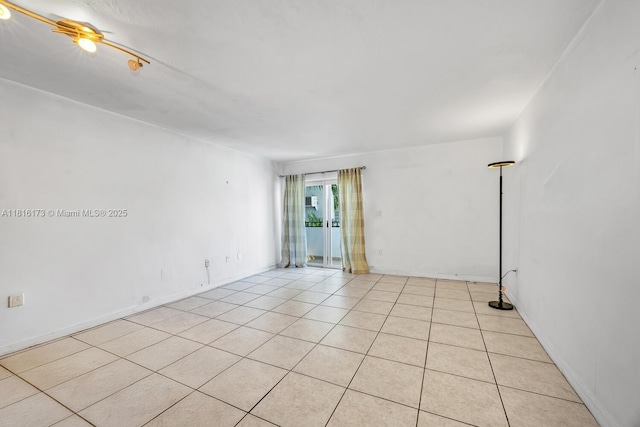 2465 SW 18th Ave Unit 3210, Miami, FL 33145 - spare room featuring light tile patterned floors