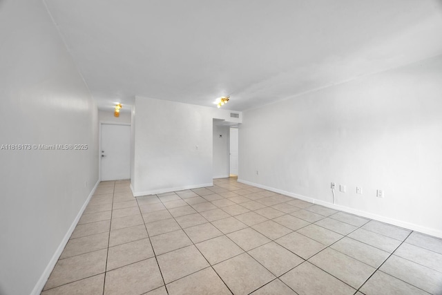 2465 SW 18th Ave Unit 3210, Miami, FL 33145 - spare room featuring light tile patterned floors and baseboards