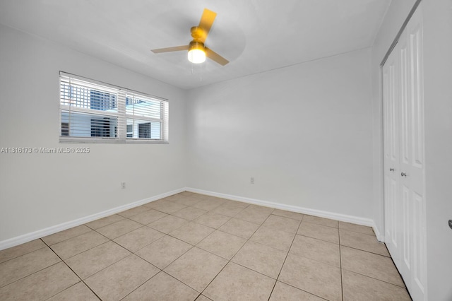 2465 SW 18th Ave Unit 3210, Miami, FL 33145 - empty room featuring ceiling fan, baseboards, and light tile patterned flooring