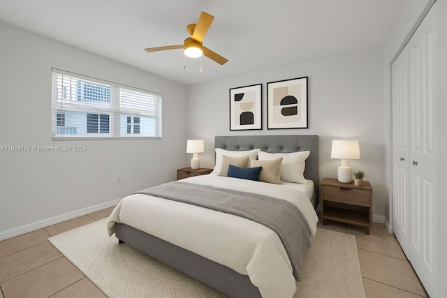 2465 SW 18th Ave Unit 3210, Miami, FL 33145 - bedroom featuring light tile patterned floors, a closet, a ceiling fan, and baseboards