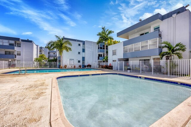 2465 SW 18th Ave Unit 3210, Miami, FL 33145 - community pool featuring a residential view